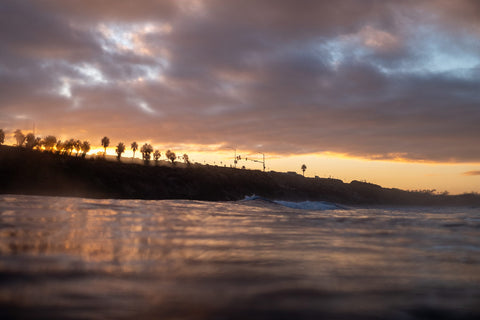 First Light VS Sunrise: The Magic of Morning Surfing