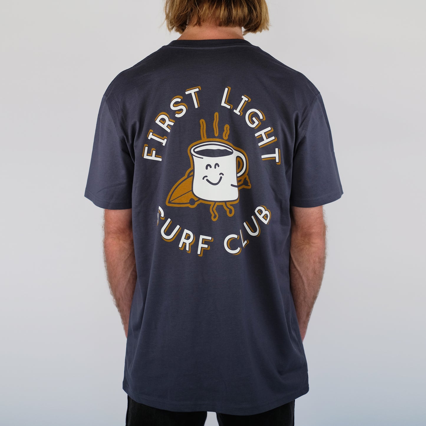 Model is 6'1" and is wearing a size Large. Petrol Blue First Light Surf Club Coffee Mug Surfing Tee Shirt