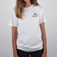 Model is 5'11" and is wearing a size Medium.. Natural White First Light Surf Club Coffee Mug Surfing Tee Shirt